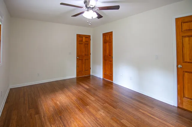 a bathroom with a sink a toilet and bathtub
