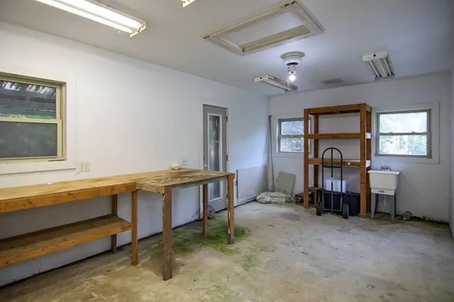 a backyard of a house with seating space