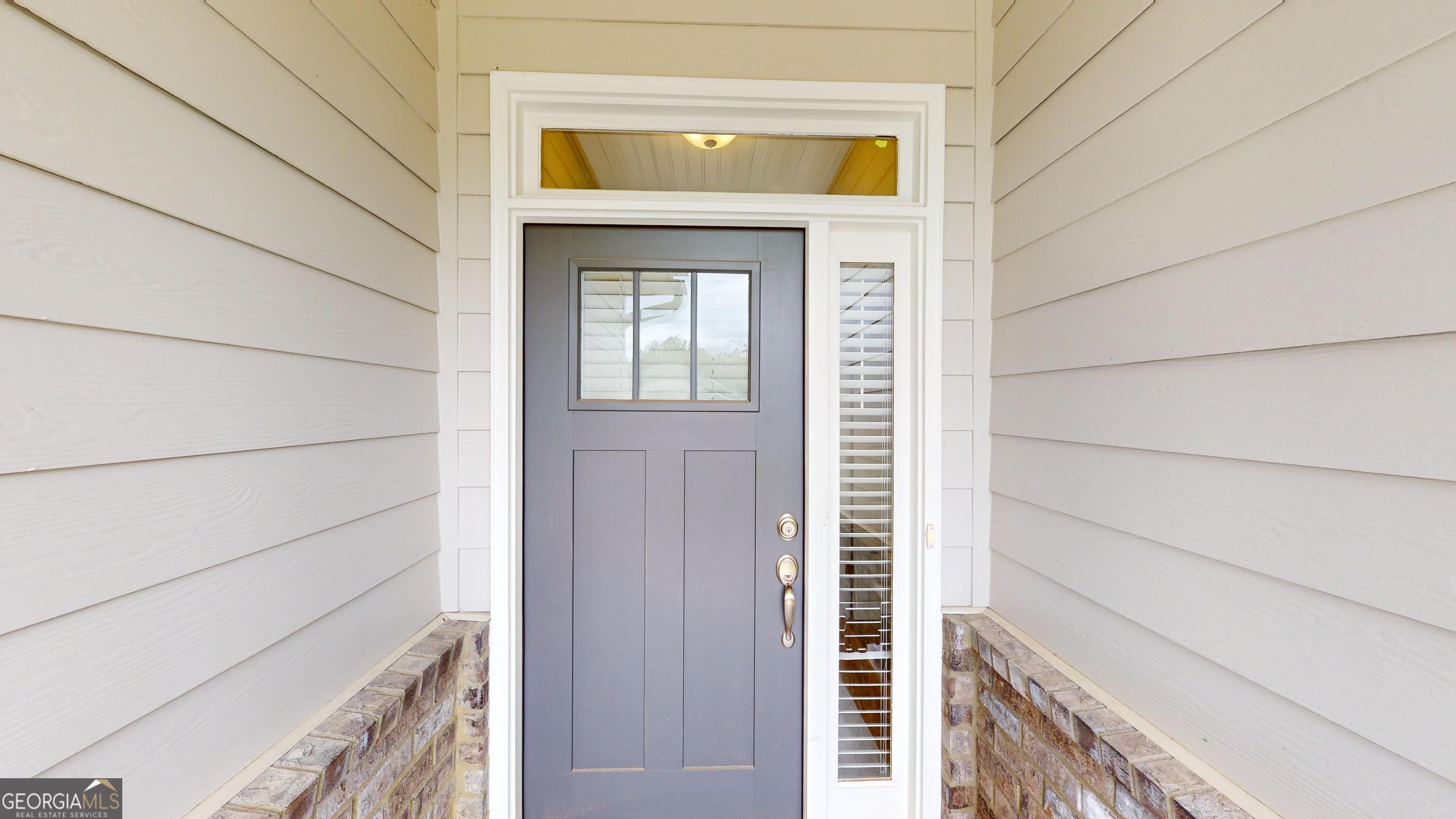 1021 Holiday Pass Griffin, GA 30223 - Photo 3 of 22 a view of front door
