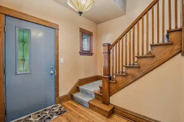 a view of entryway with wooden floor
