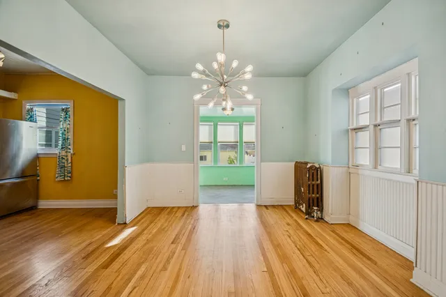 a view of livingroom with hardwood floor and a ceiling fan