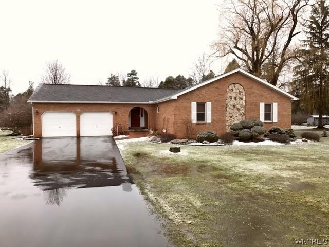 174 Pavement Road Lancaster, NY 14086 - Photo 1 of 1 Brick & Stone front , covered "alcove" on front po