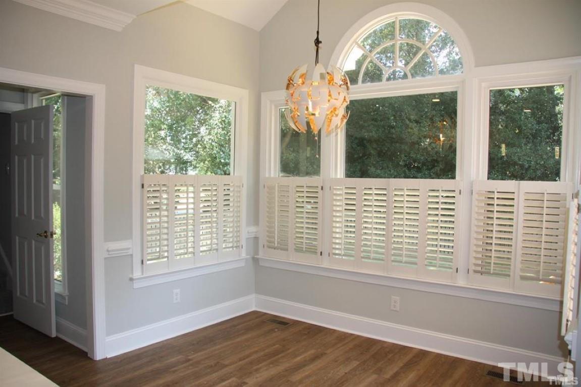 204 Morrow Mountain Drive Cary, NC 27513 - Photo 16 of 40 a view of room with wooden floor and windows