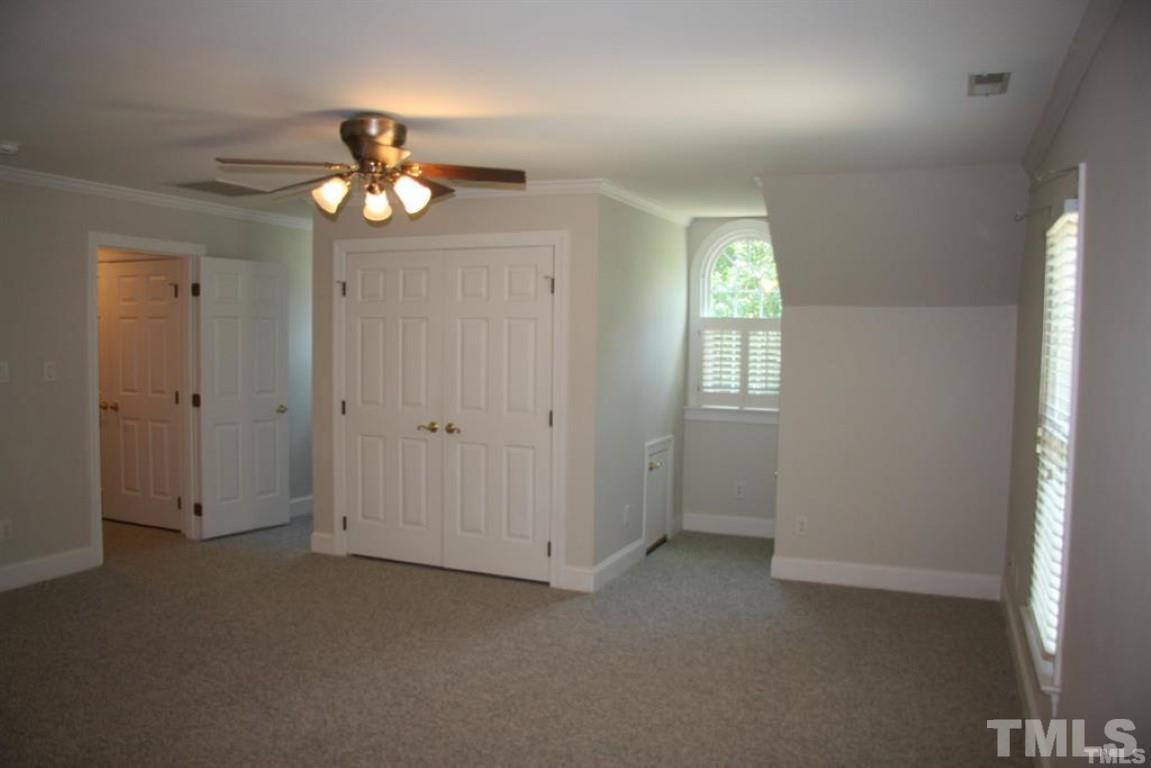 204 Morrow Mountain Drive Cary, NC 27513 - Photo 20 of 40 a view of an empty room with a window