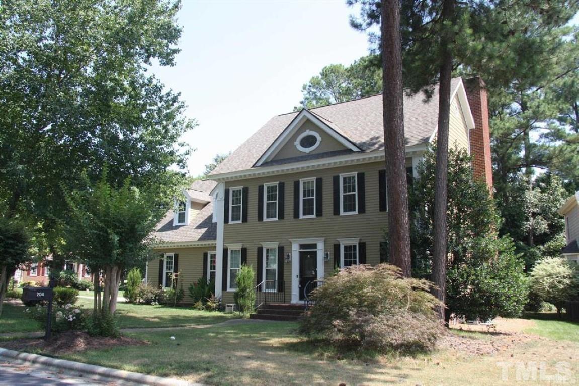 204 Morrow Mountain Drive Cary, NC 27513 - Photo 2 of 40 a front view of a house with a yard