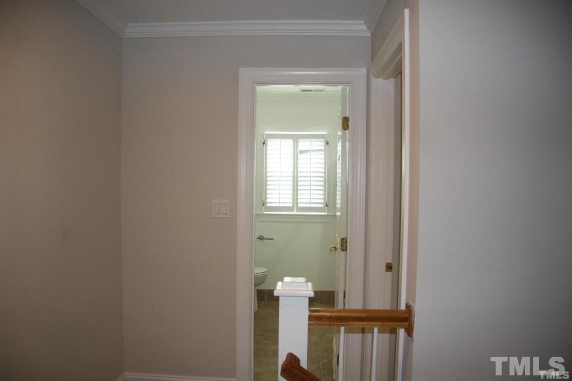 204 Morrow Mountain Drive Cary, NC 27513 - Photo 21 of 40 a view of hallway with stairs