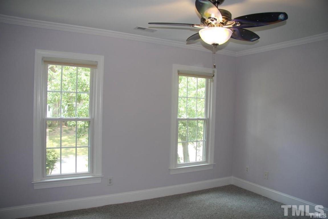 204 Morrow Mountain Drive Cary, NC 27513 - Photo 30 of 40 a view of an empty room with a window