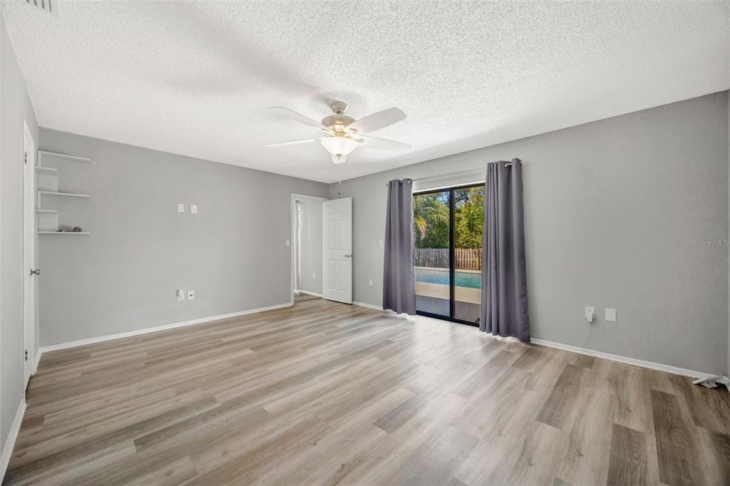 10199 Elgin Boulevard Spring Hill, FL 34608 - Photo 15 of 66 a view of an empty room with a window