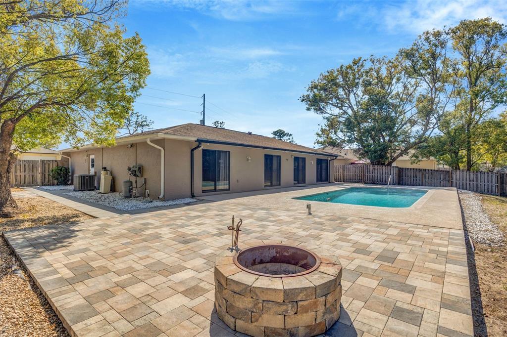 10199 Elgin Boulevard Spring Hill, FL 34608 - Photo 45 of 66 a view of a house with a yard