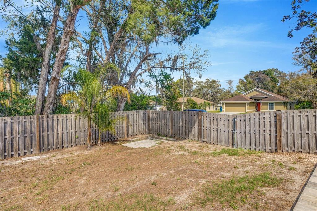 10199 Elgin Boulevard Spring Hill, FL 34608 - Photo 49 of 66 a view of a fence in the roof deck of a house