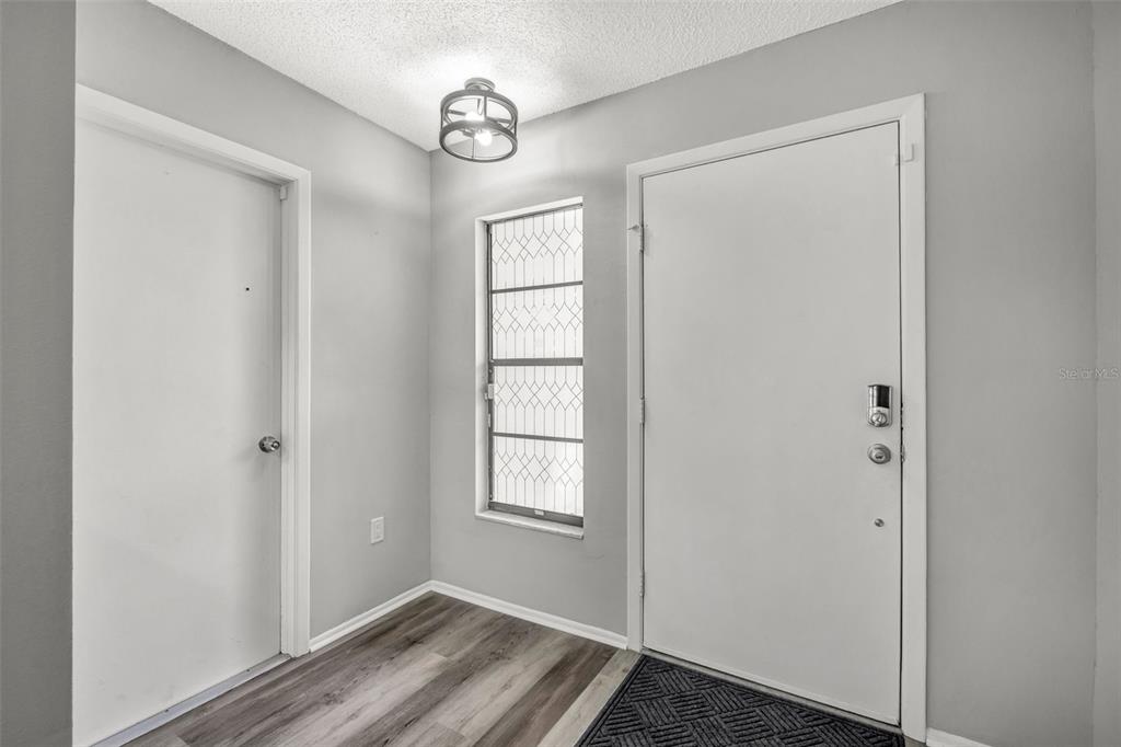 10199 Elgin Boulevard Spring Hill, FL 34608 - Photo 6 of 66 a view of livingroom with window