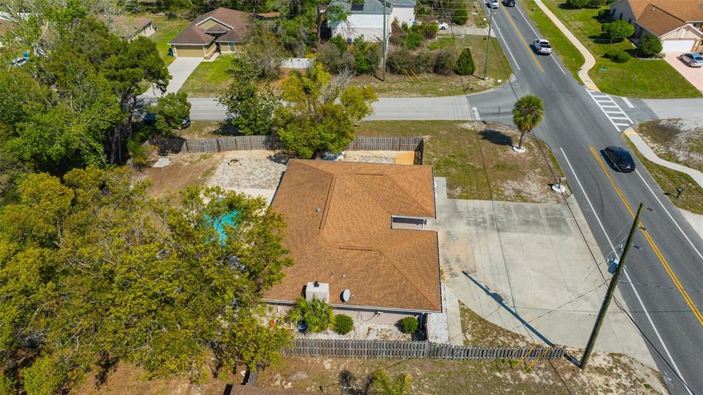 10199 Elgin Boulevard Spring Hill, FL 34608 - Photo 61 of 66 an aerial view of a house with a yard