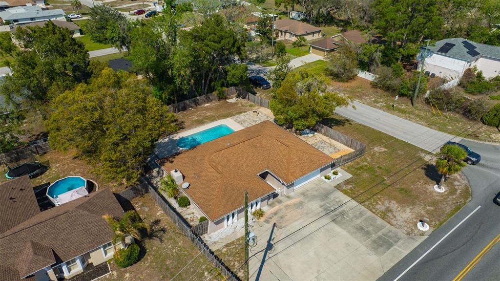 10199 Elgin Boulevard Spring Hill, FL 34608 - Photo 62 of 66 an aerial view of a house with outdoor space