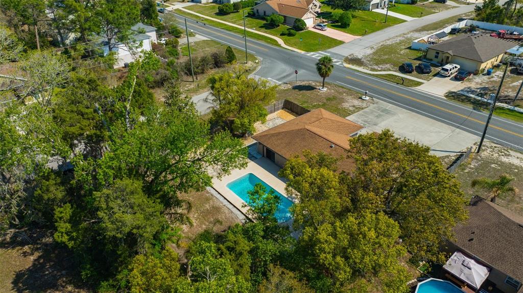 10199 Elgin Boulevard Spring Hill, FL 34608 - Photo 63 of 66 an aerial view of a house with a yard