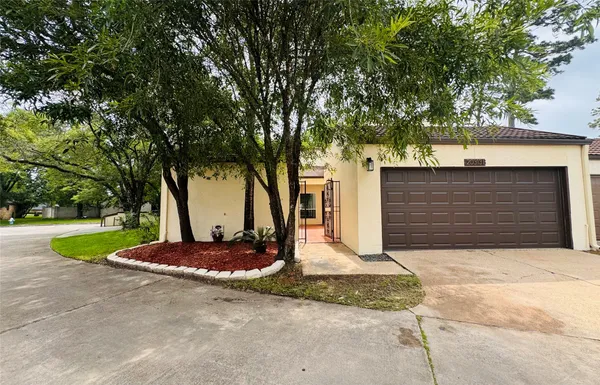 a kitchen with stainless steel appliances granite countertop table chairs sink and cabinets