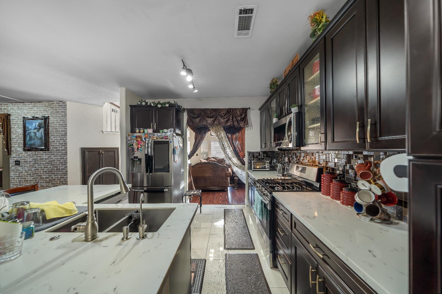 1114 Kay Circle Turlock, CA 95382 - Photo 21 of 40 a view of a room with gym equipment