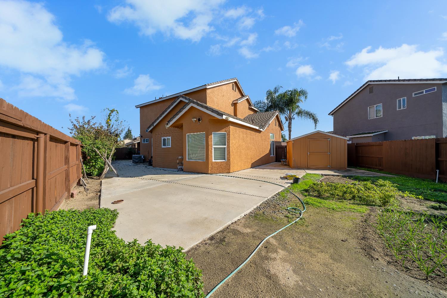 1114 Kay Circle Turlock, CA 95382 - Photo 37 of 40 a front view of a house with a yard and garage