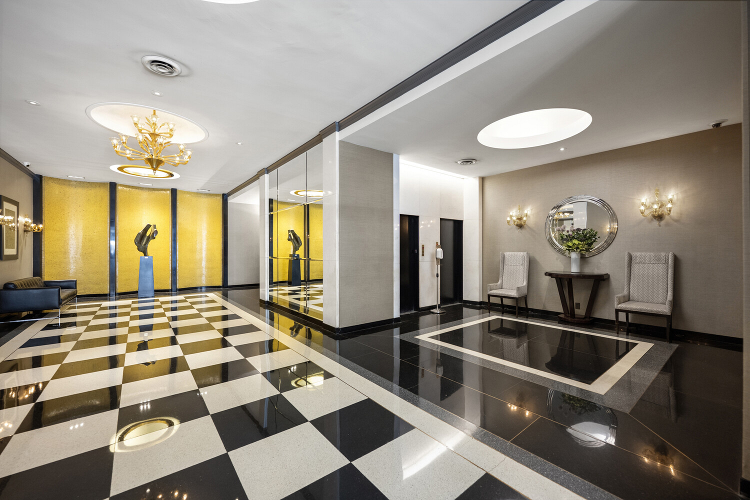 165 East 72nd Street, Unit 12J Manhattan, NY 10021 - Photo 11 of 13 a bathroom with a sink a mirror and a shower