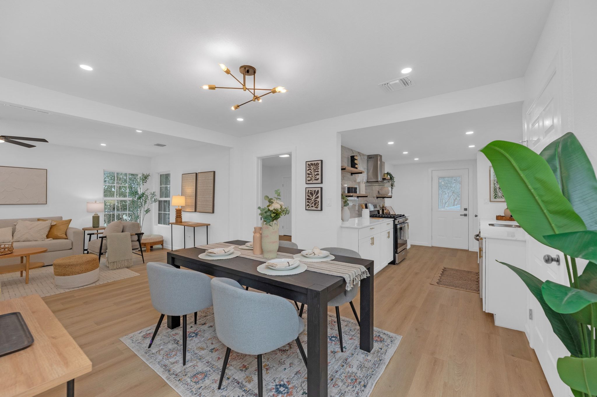1709 Cecelia Street Taylor, TX 76574 - Photo 20 of 38 Dining space with light wood-type flooring, ceiling fan, and suspended lighting