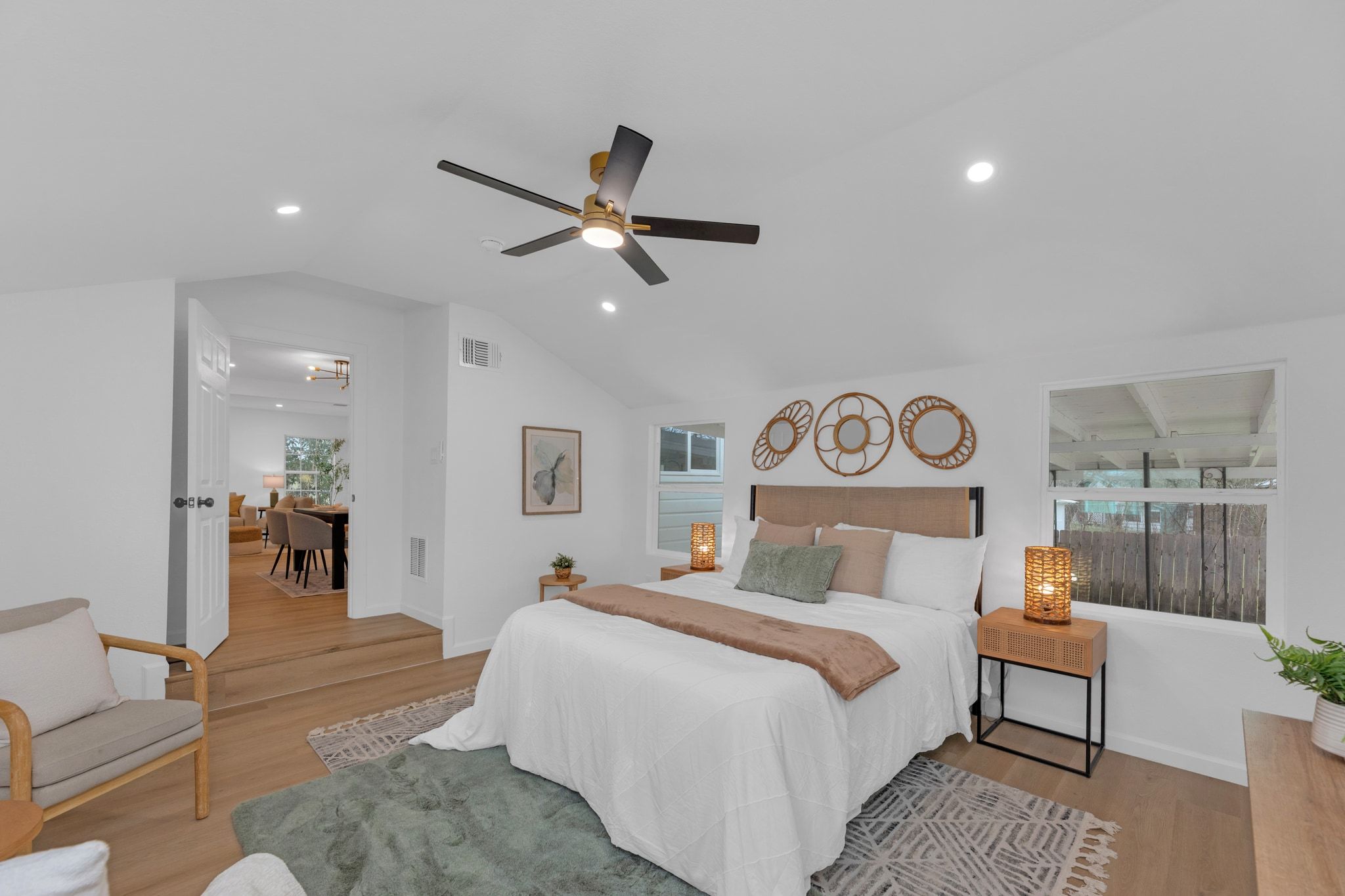 1709 Cecelia Street Taylor, TX 76574 - Photo 24 of 38 Bedroom featuring light wood-type flooring, lofted ceiling, a ceiling fan, and recessed lighting