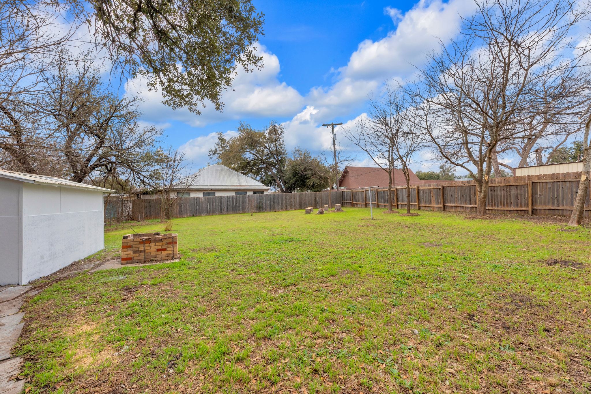 1709 Cecelia Street Taylor, TX 76574 - Photo 33 of 38 View of fenced backyard