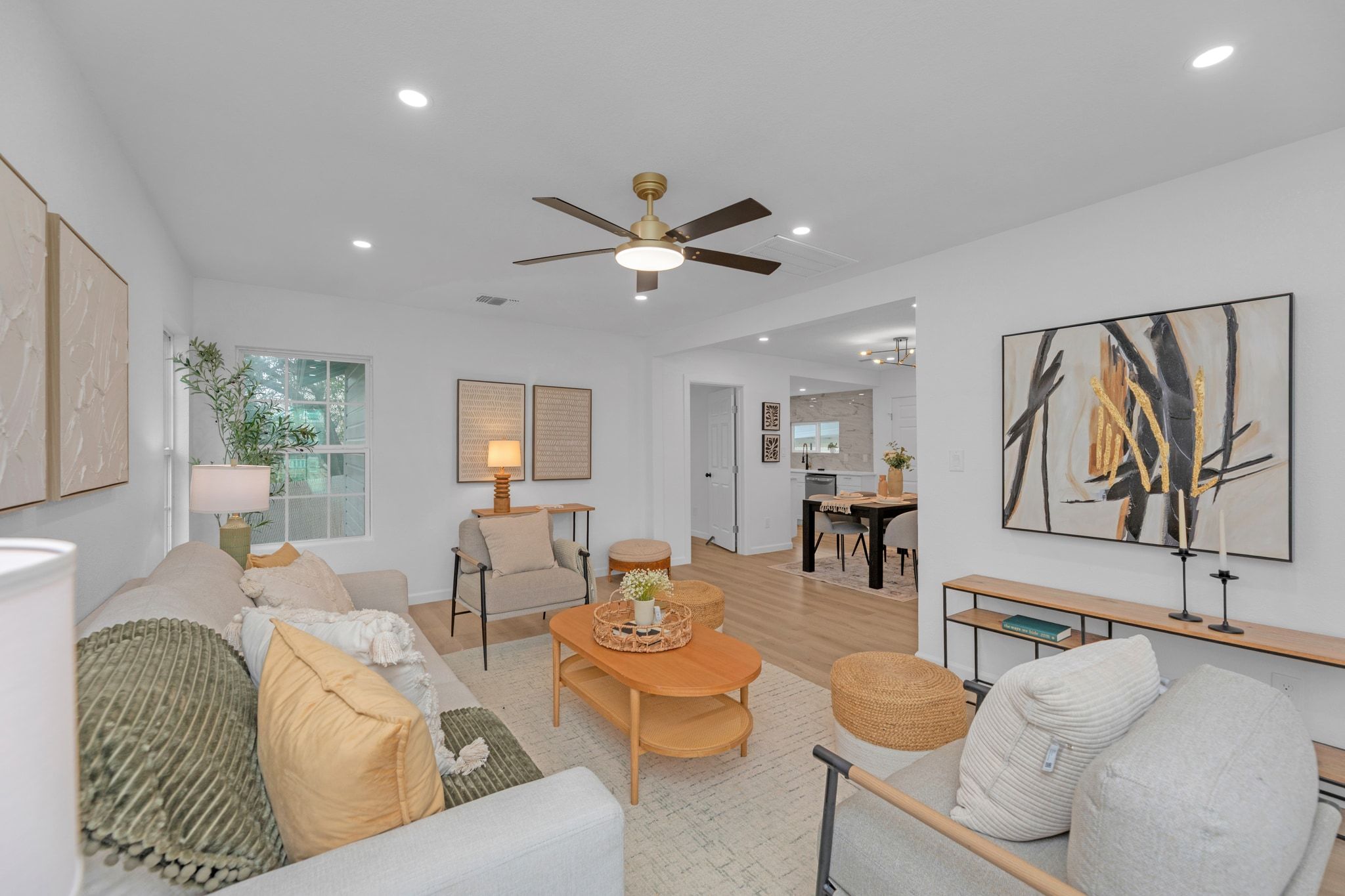 1709 Cecelia Street Taylor, TX 76574 - Photo 9 of 38 Living area featuring wood finished floors, a ceiling fan, and recessed lighting