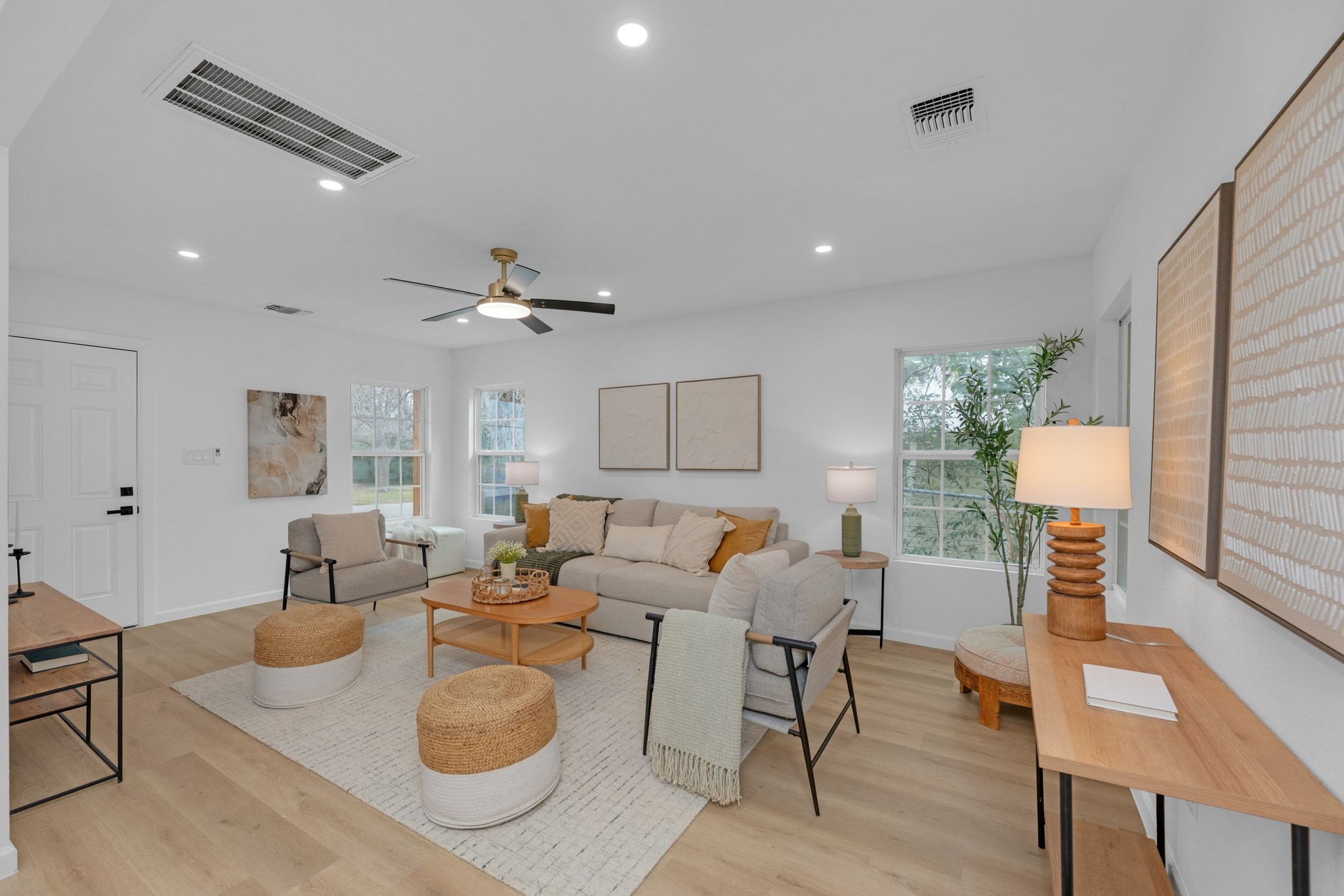 1709 Cecelia Street Taylor, TX 76574 - Photo 10 of 38 Living area featuring light wood-style flooring, plenty of natural light, recessed lighting, and a ceiling fan