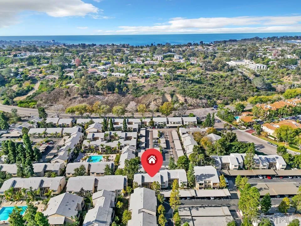 8640 Via Mallorca, Unit H La Jolla, CA 92037 - Photo 4 of 13 an aerial view of residential building and parking space