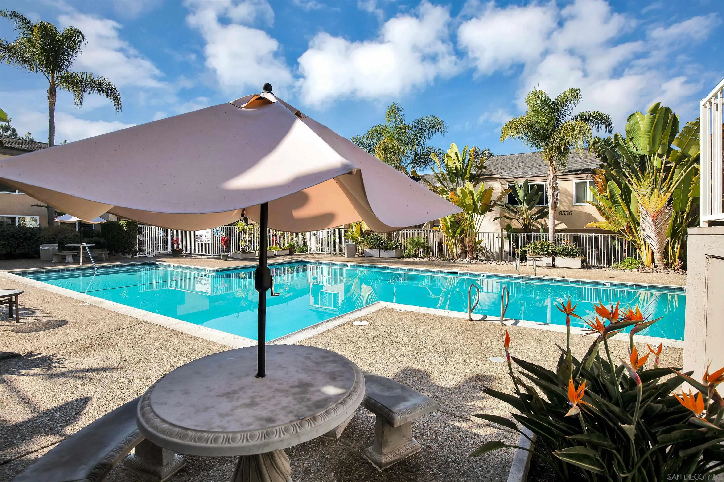 8640 Via Mallorca, Unit H La Jolla, CA 92037 - Photo 10 of 13 a view of a patio with a table