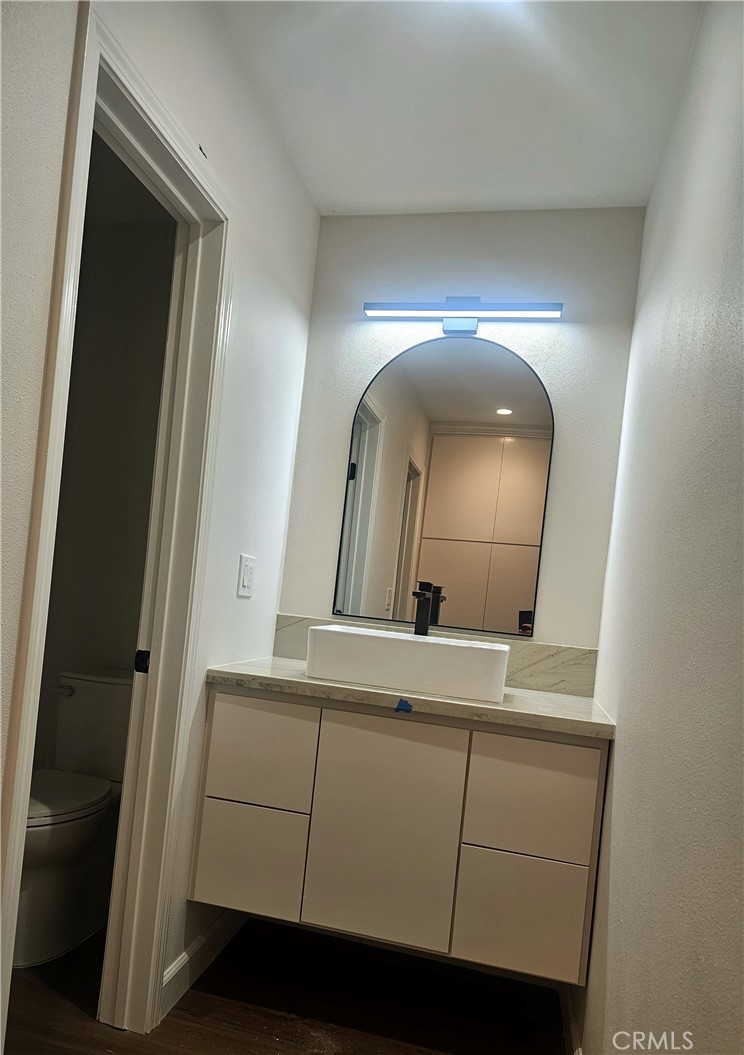 7890 East Spring Street Long Beach, CA 90815 - Photo 3 of 8 a view of a mirror