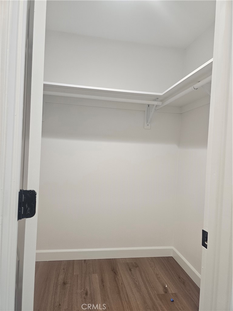 7890 East Spring Street Long Beach, CA 90815 - Photo 5 of 8 a view of an empty walk in closet