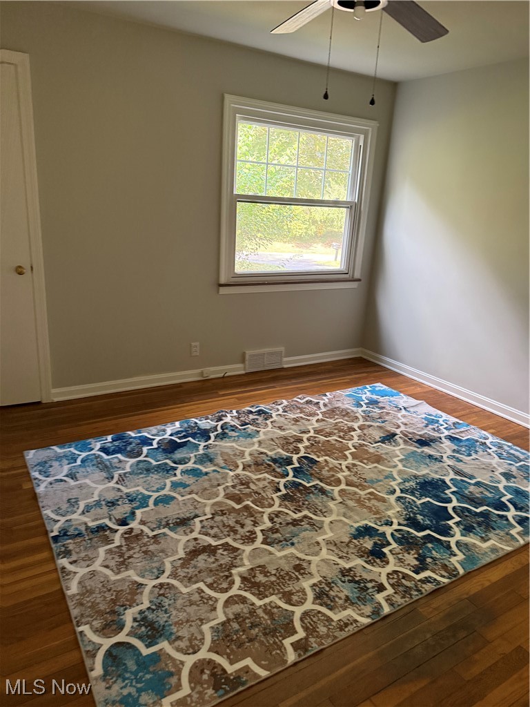 2520 Holgate Road Akron, OH 44313 - Photo 22 of 41 Bedroom featuring dark wood-style flooring and a ceiling fan