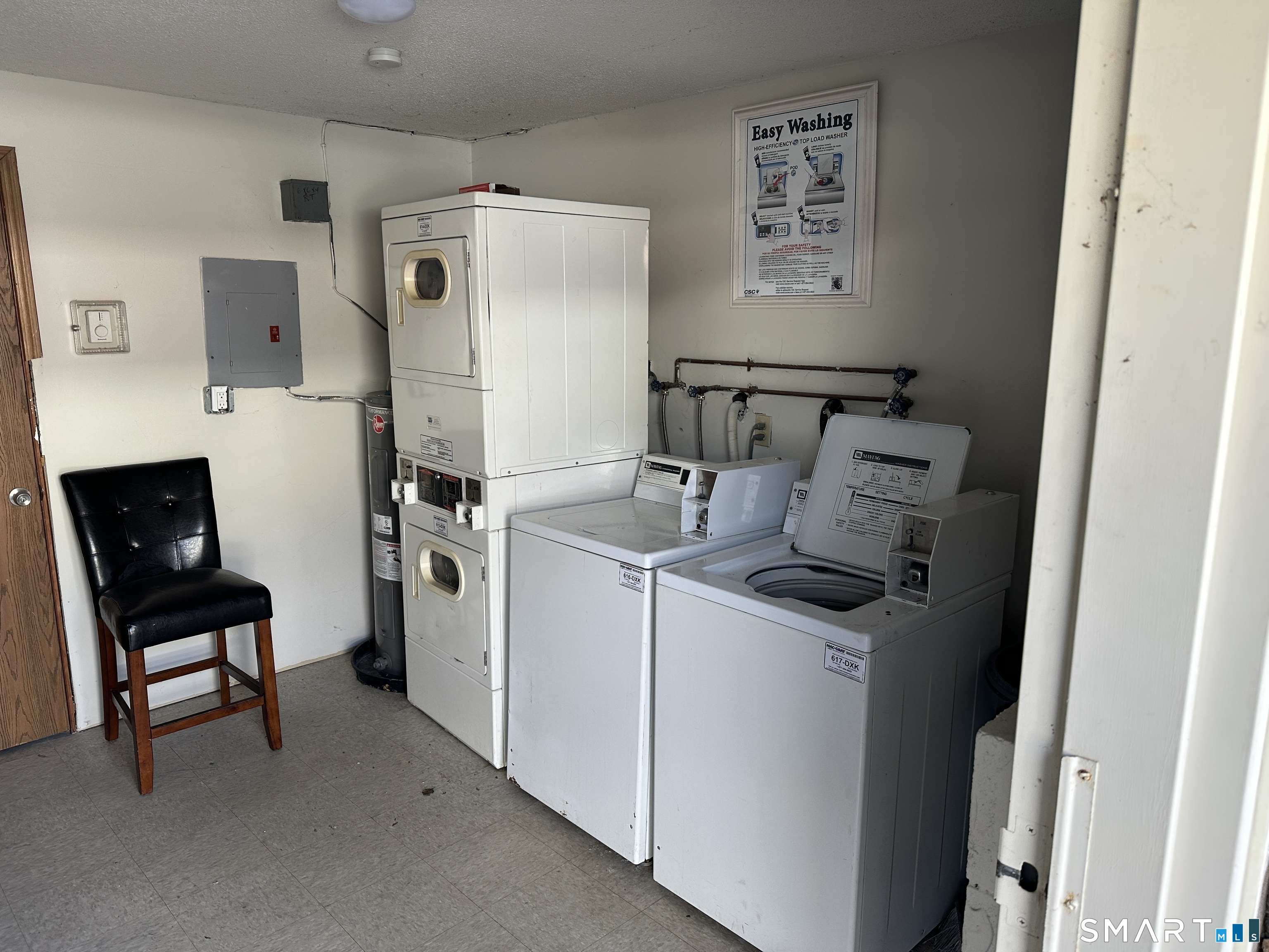 114 Bucks Hill Road, Unit 4 Waterbury, CT 06704 - Photo 11 of 12 a utility room with dryer and washer