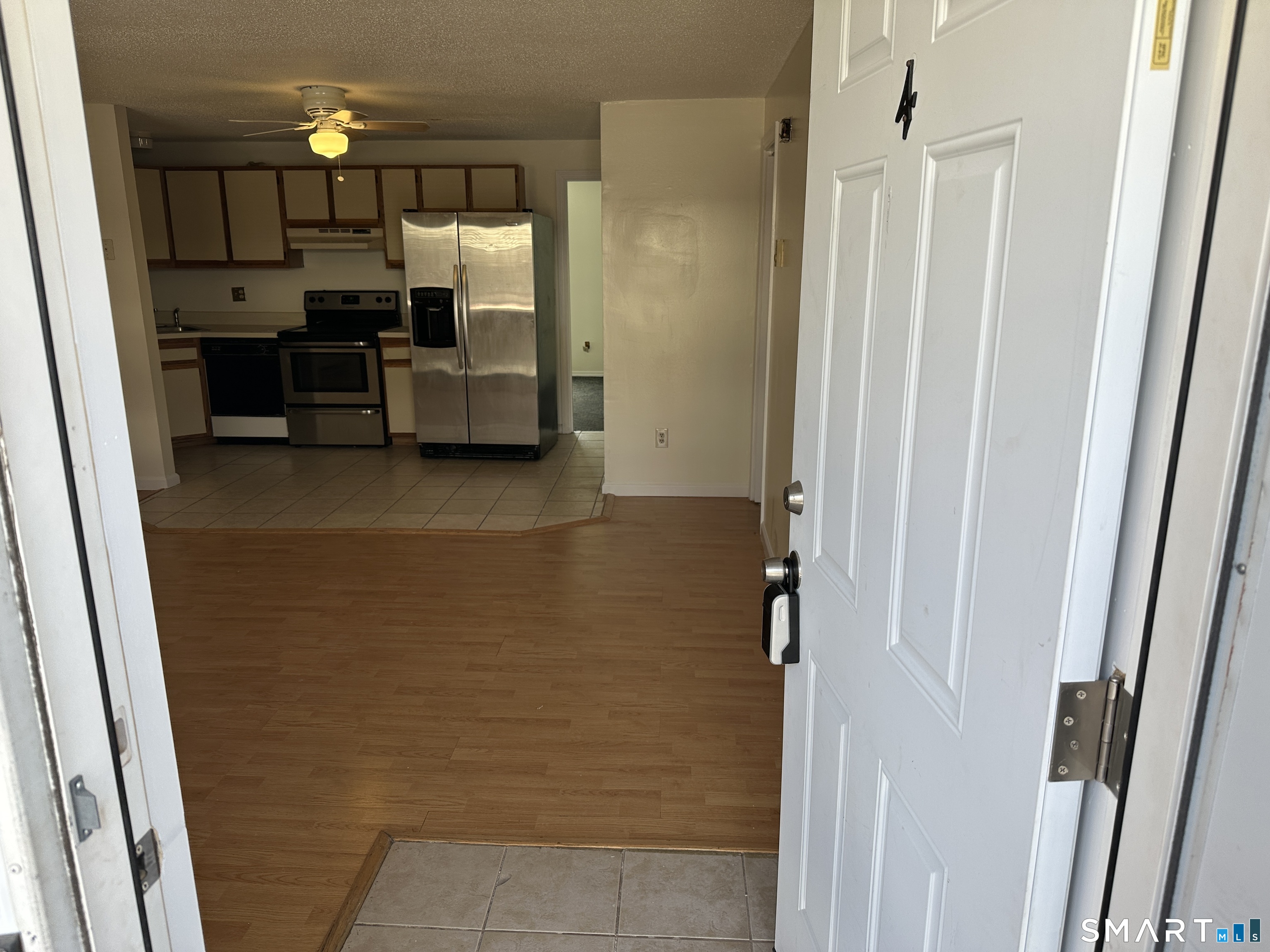 114 Bucks Hill Road, Unit 4 Waterbury, CT 06704 - Photo 2 of 12 a view of kitchen and utility room