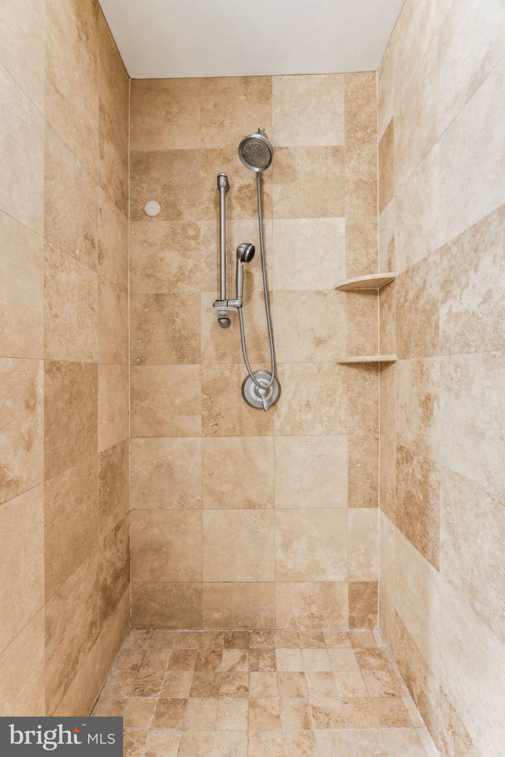 1701 Locust Street, Unit 2111 Philadelphia, PA 19103 - Photo 16 of 25 a bathroom with a shower