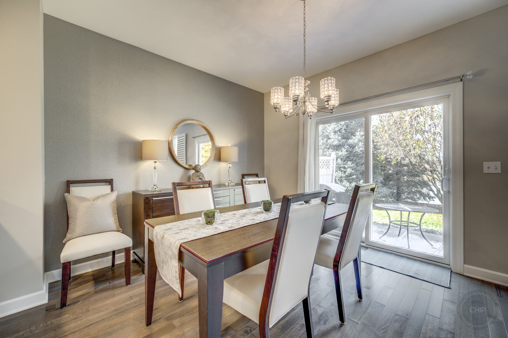 201 Dorset Avenue, Unit 201 Oswego, IL 60543 - Photo 13 of 41 a view of a dining room with furniture window and wooden floor