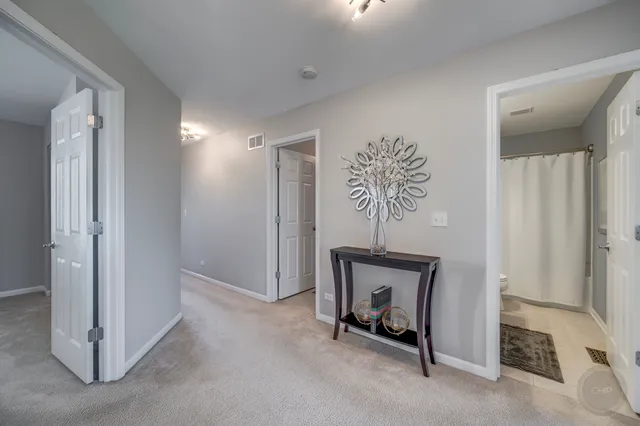 a view of a hallway with workspace