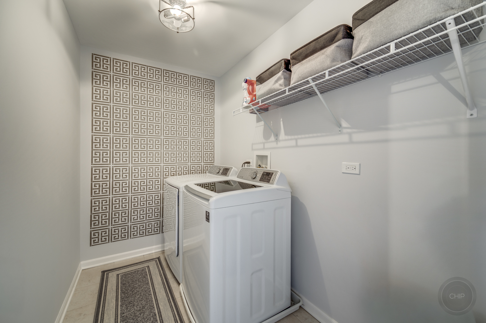 201 Dorset Avenue, Unit 201 Oswego, IL 60543 - Photo 28 of 41 a utility room with dryer and washer