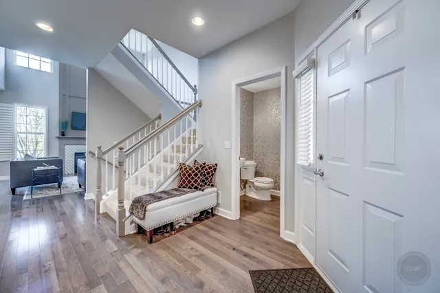 a living room with furniture and a rug