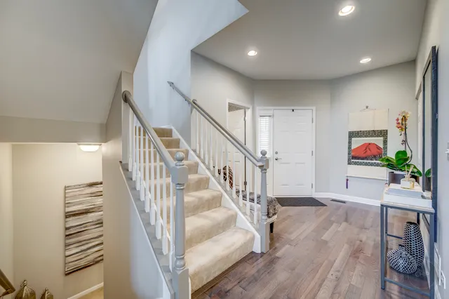 a view of entryway with wooden floor
