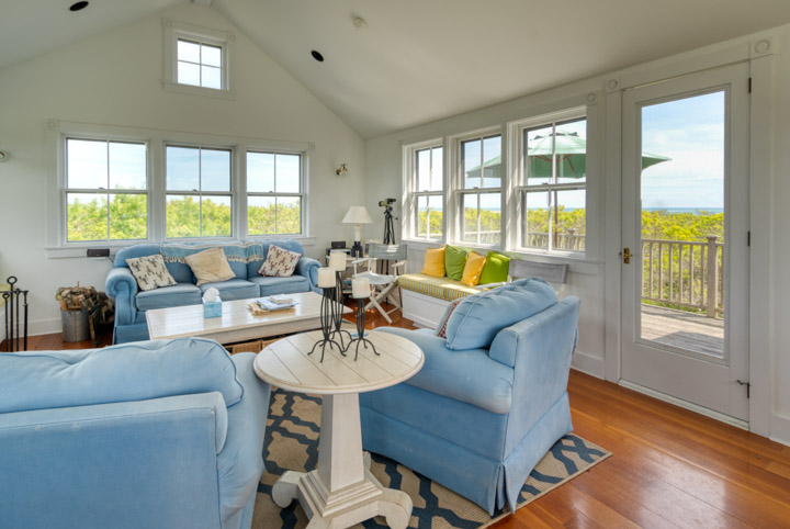 94-21 Tuckernuck Nantucket, MA 02554 - Photo 6 of 20 a living room with furniture and floor to ceiling windows