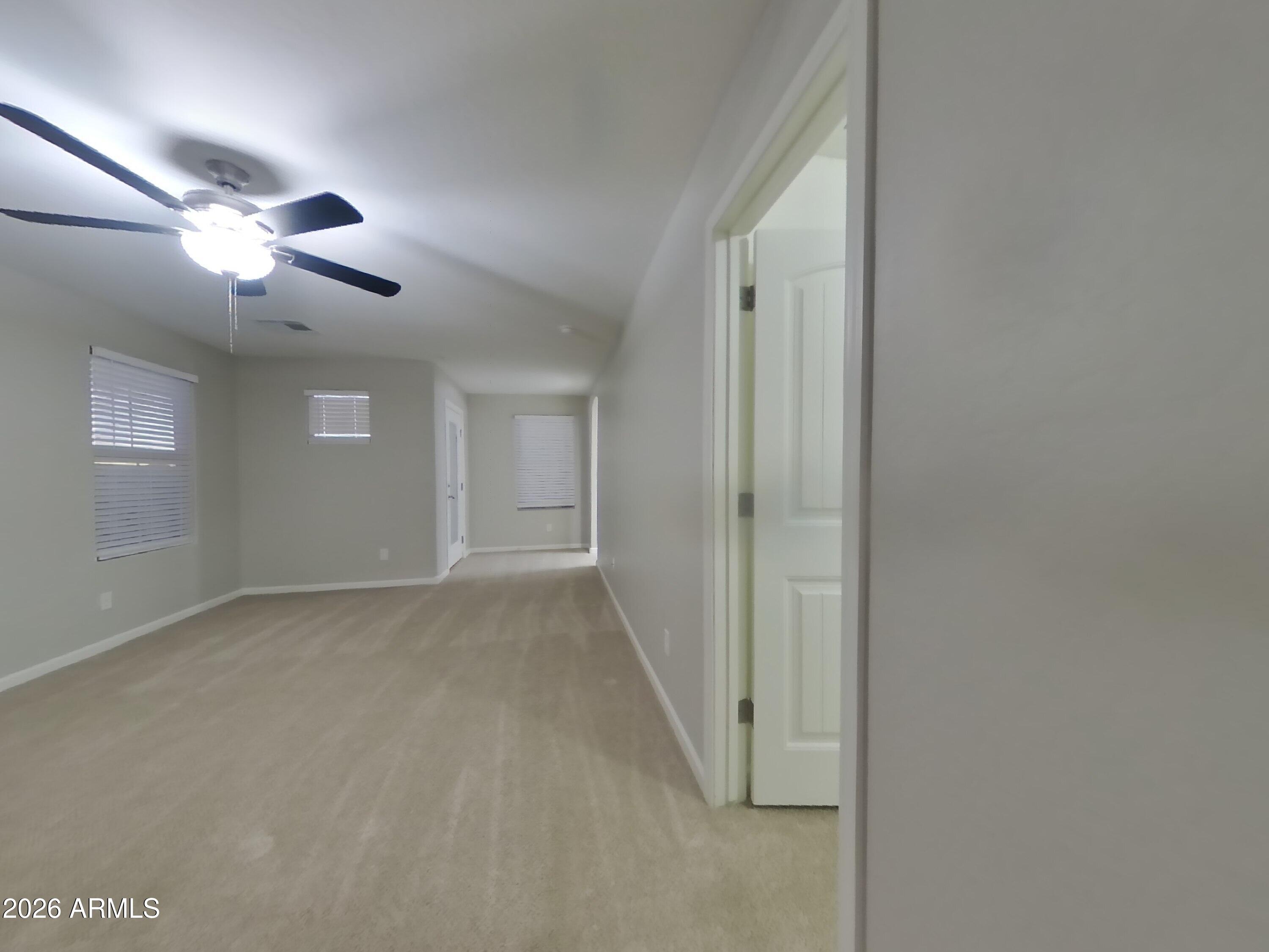 12563 West Gentle Rain Road Peoria, AZ 85383 - Photo 9 of 16 a view of an empty room