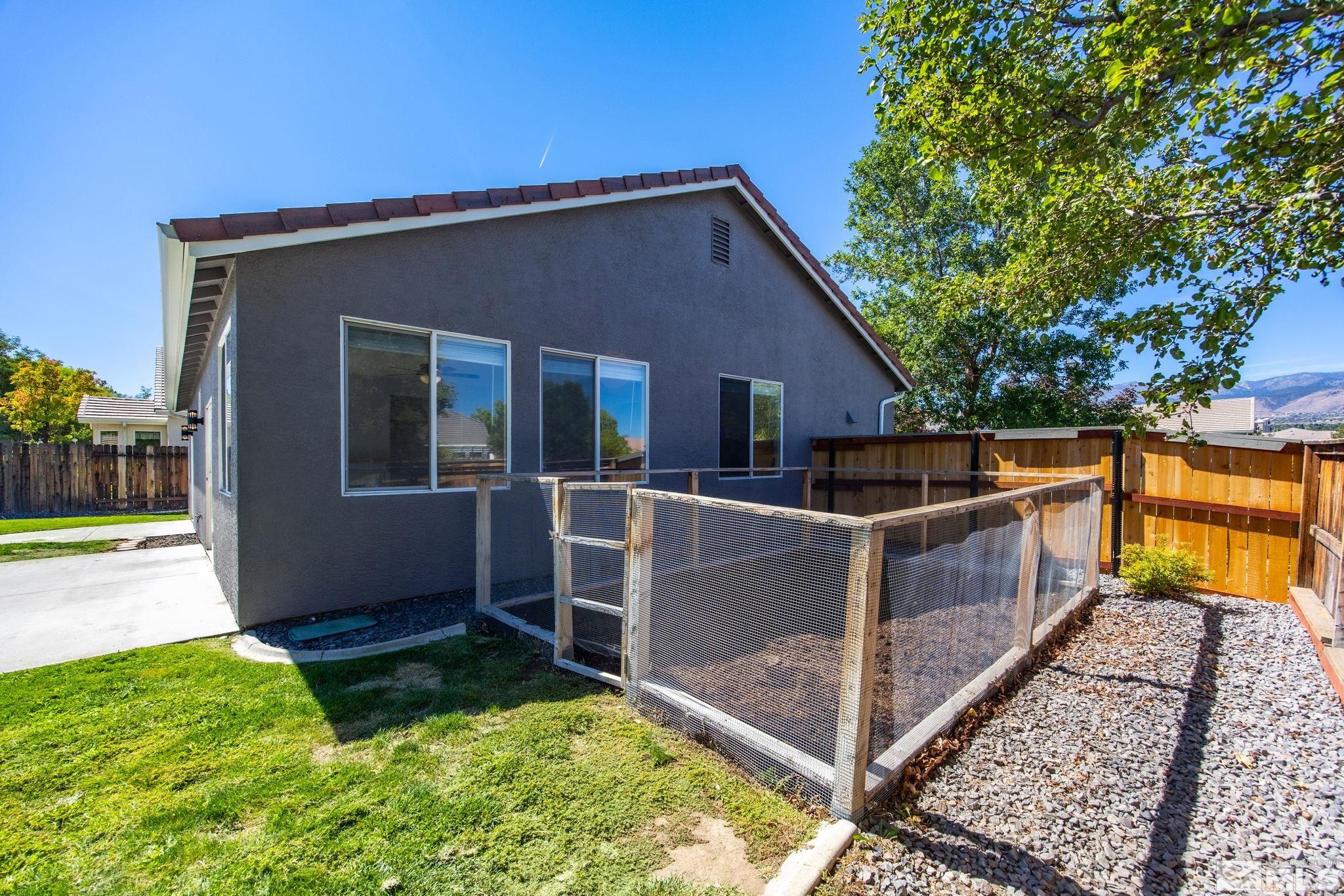 10600 Arbor Way Reno, NV 89521 - Photo 33 of 33 a view of house with backyard