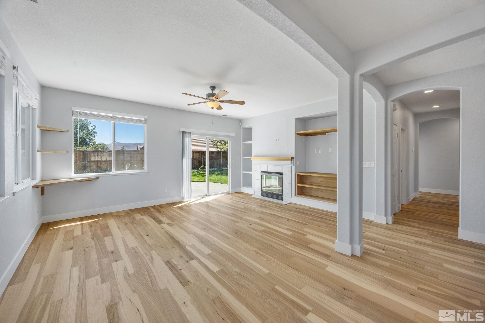 10600 Arbor Way Reno, NV 89521 - Photo 8 of 33 a view of empty room with wooden floor and fan