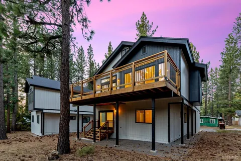 a front view of a house with parking