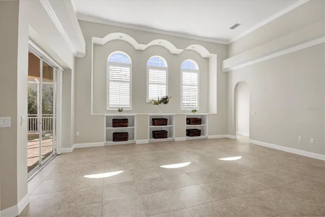 a view of a large room with windows