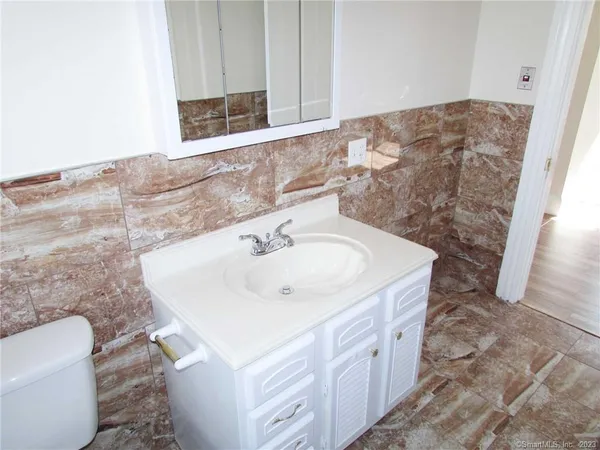 a bathroom with a sink and a toilet