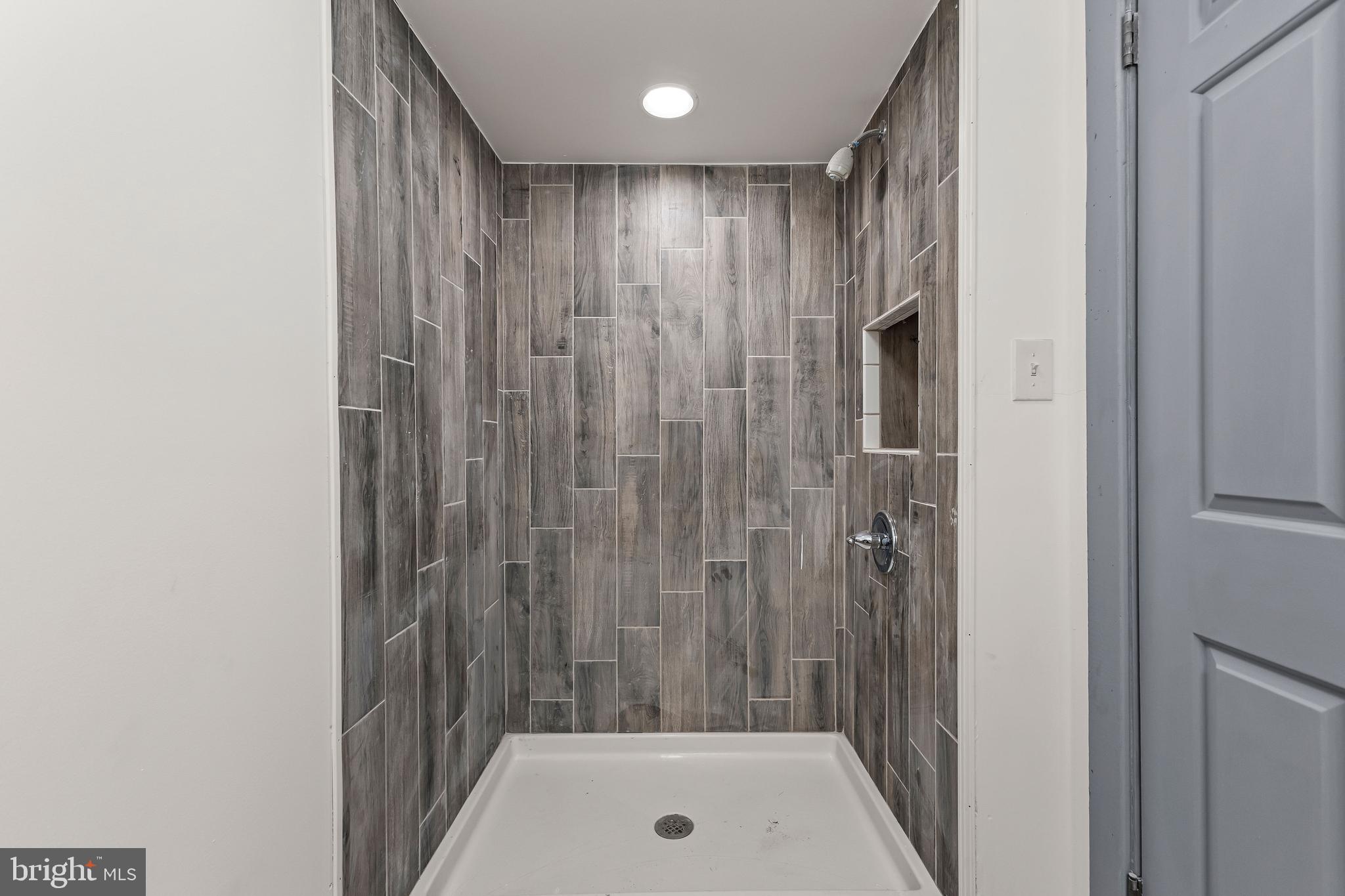 780 White Hall Road Littlestown, PA 17340 - Photo 14 of 36 a bathroom with a shower and a tub