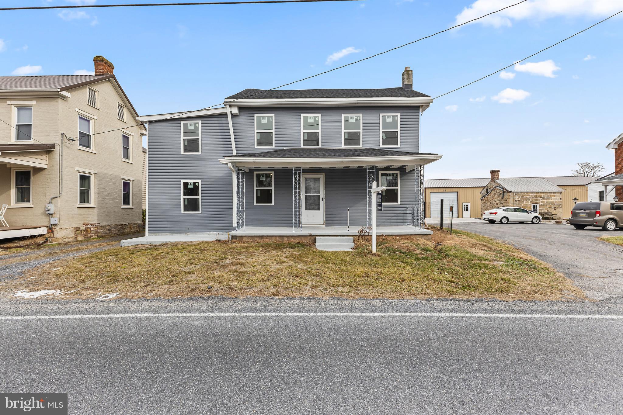 780 White Hall Road Littlestown, PA 17340 - Photo 2 of 36 a view of a house with a outdoor space