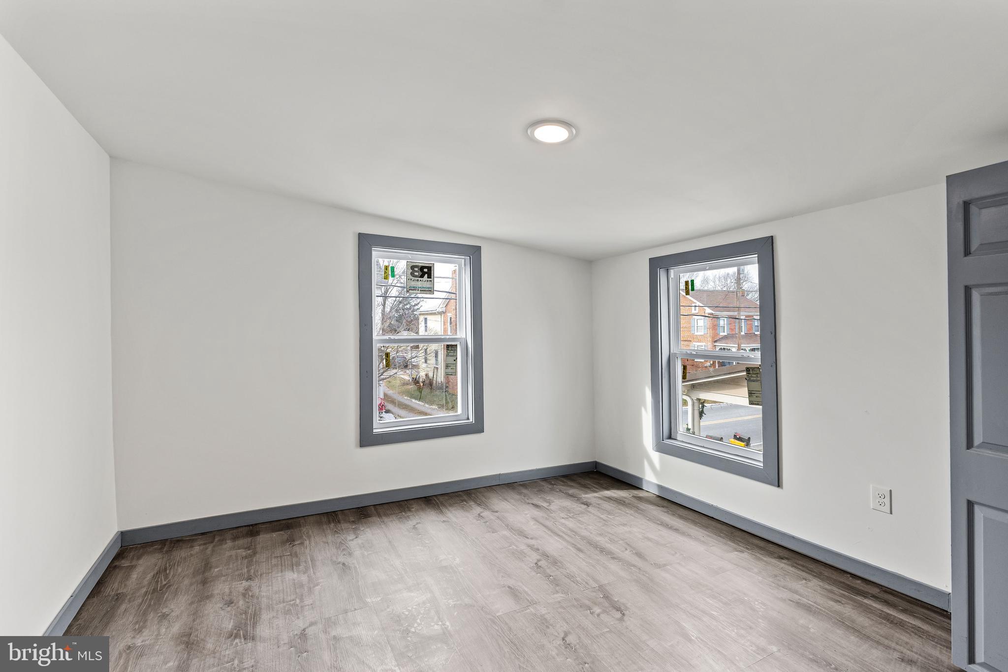 780 White Hall Road Littlestown, PA 17340 - Photo 22 of 36 an empty room with windows